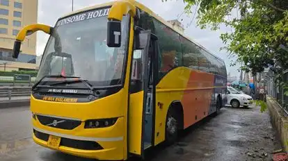 Winsome Holiday Bus-Side Image