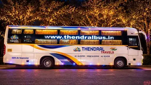 THENDRAL TRAVELS Bus-Front Image