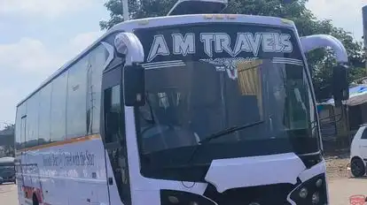 AM TOURS AND TRAVELS Bus-Front Image