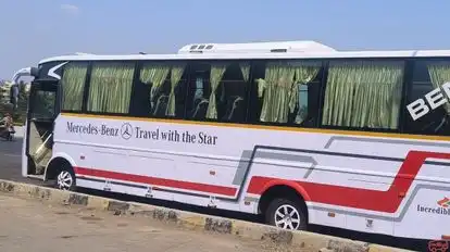 AM TOURS AND TRAVELS Bus-Side Image