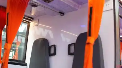 REDWINGE BUS Bus-Side Image