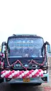 RADHE TRAVELS Bus-Front Image