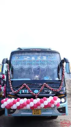 RADHE TRAVELS Bus-Front Image