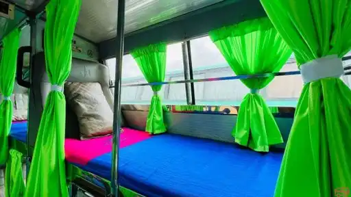 VARNIKA TRAVELS & TRANSPORT Bus-Front Image