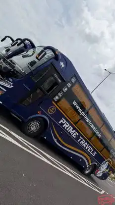 PRIME TRAVELS Bus-Side Image