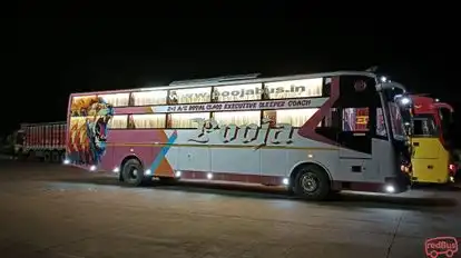 Pooja  travels  Bus-Side Image