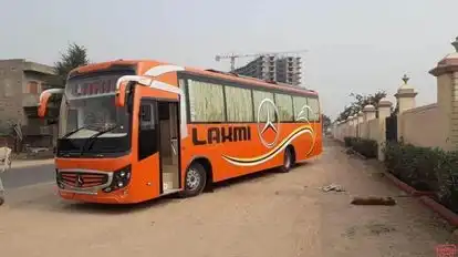 Laxmi traveller Bus-Front Image