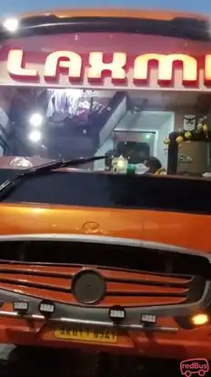 Laxmi traveller Bus-Front Image