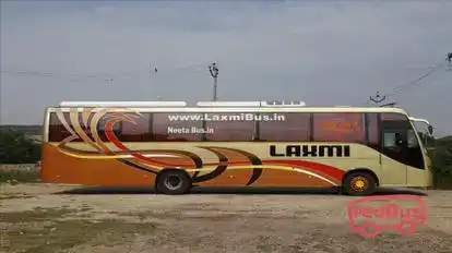 Laxmi traveller Bus-Side Image