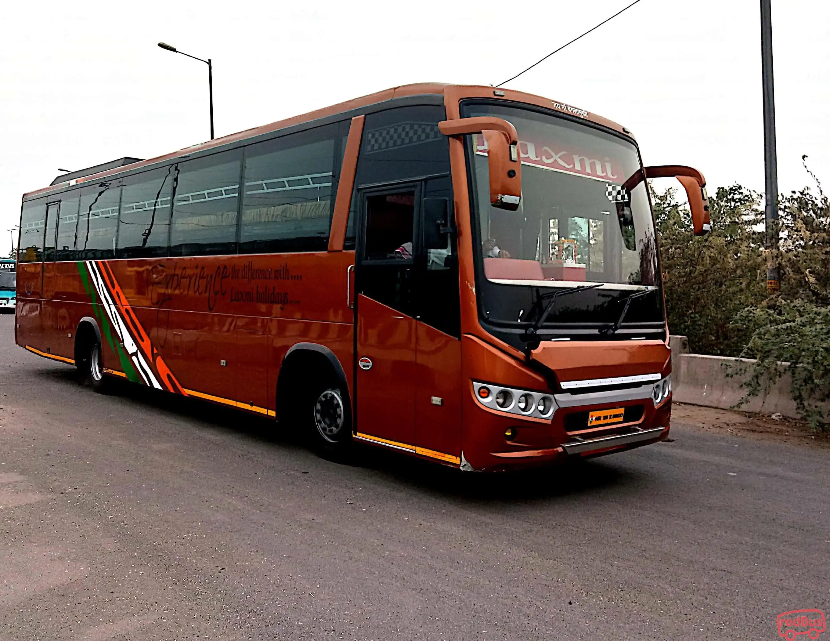 Laxmi holidays Bus-Front Image