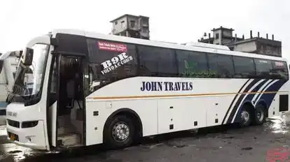 John  Travels Bus-Side Image