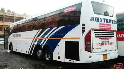 John  Travels Bus-Side Image