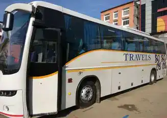 John  Travels Bus-Side Image