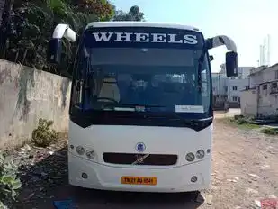 Wheels Tourist Transports Bus-Front Image