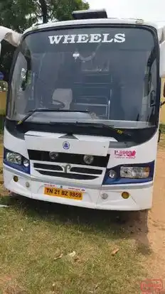 Wheels Tourist Transports Bus-Front Image