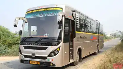 Shrinath® Travel Agency Pvt. Ltd. Bus-Side Image