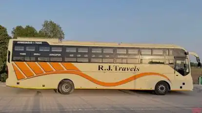 R J  Travels Bus-Side Image