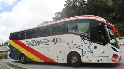 The One Travel & Tours Bus-Side Image