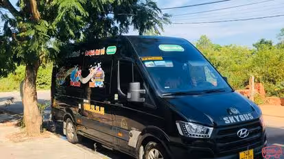 Travelbus Bus-Side Image