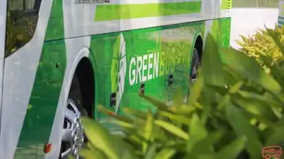 Green Travel Bus-Side Image