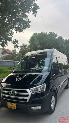 Newstar Travel Bus-Side Image